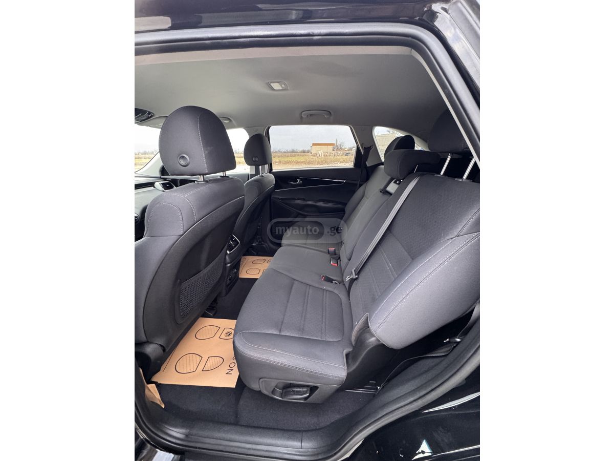 Kia Sorento - фото 11