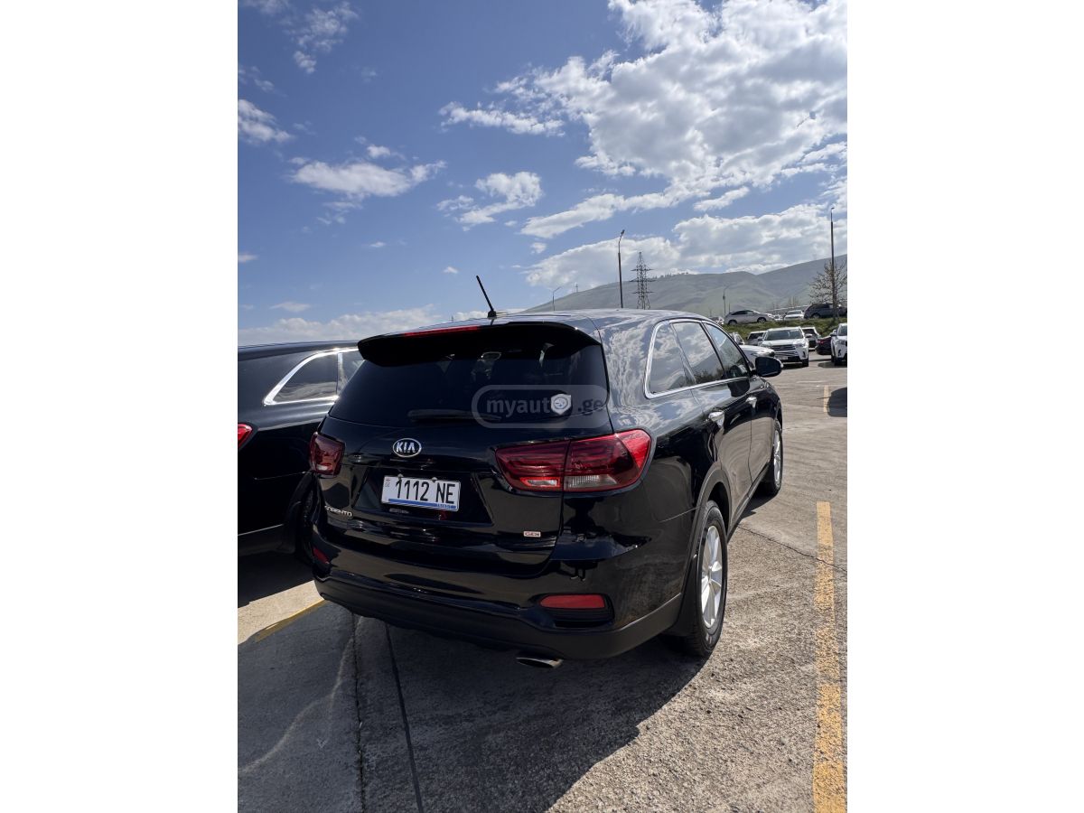 Kia Sorento - фото 5