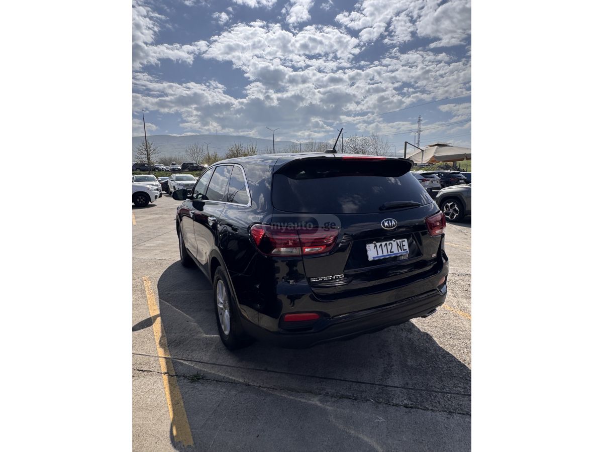 Kia Sorento - фото 7