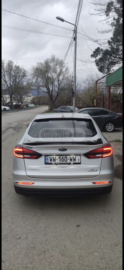 Ford Fusion - фото 7