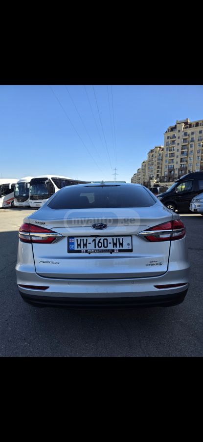 Ford Fusion - фото 9