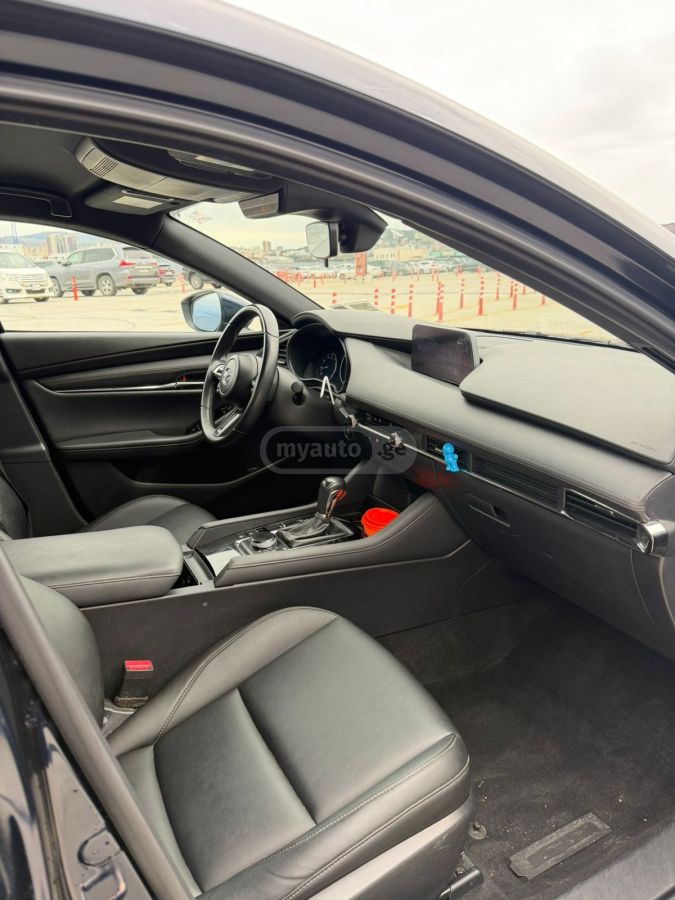 Mazda Mazda 3 - фото 13