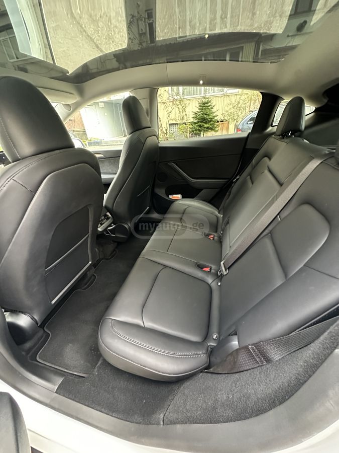 Tesla Model Y - фото 9