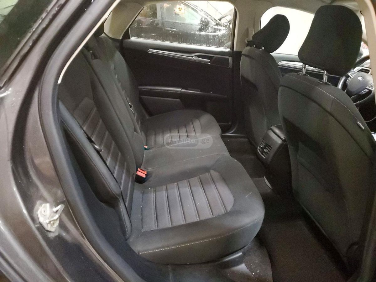 Ford Fusion - фото 10