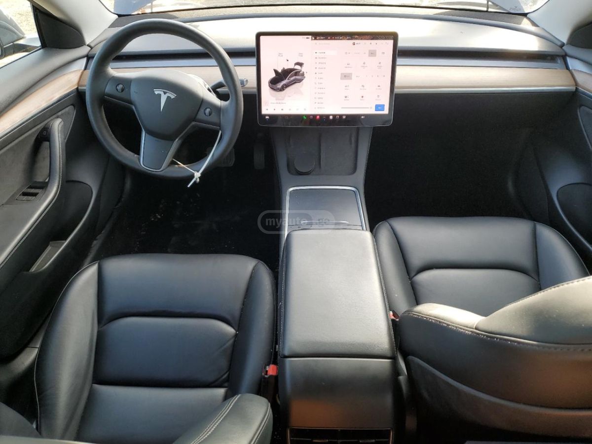 Tesla Model 3 - фото 8