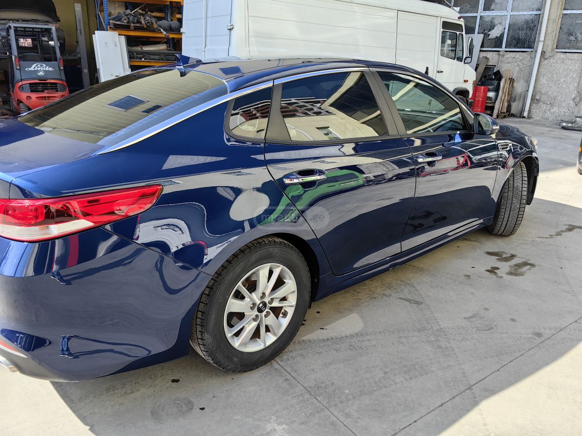 Kia Optima - фото 4