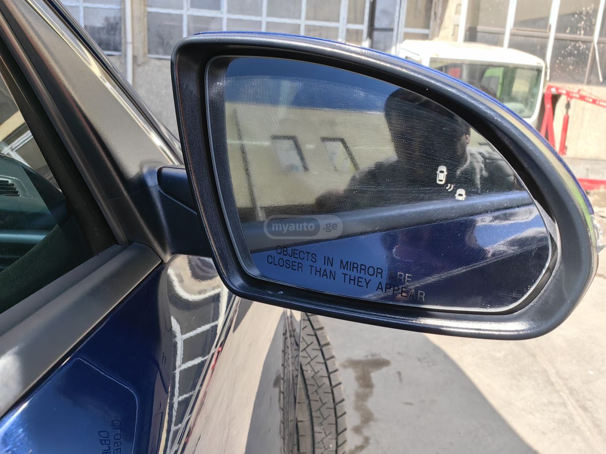 Kia Optima - фото 6