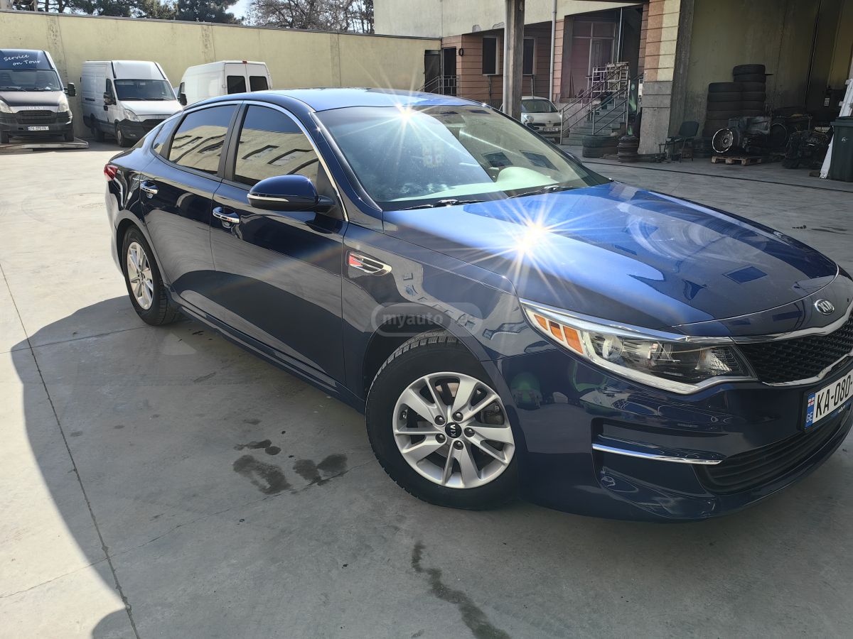 Kia Optima - фото 8