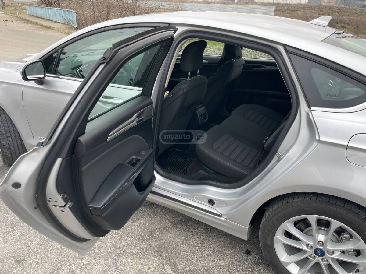 Ford Fusion - фото 7