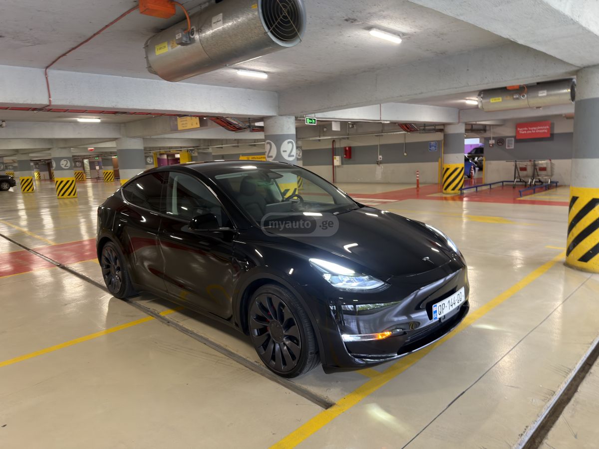 Tesla Model Y 2025 — фото 14 купить в Москве