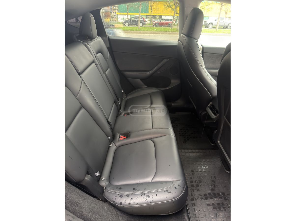 Tesla Model Y - фото 7