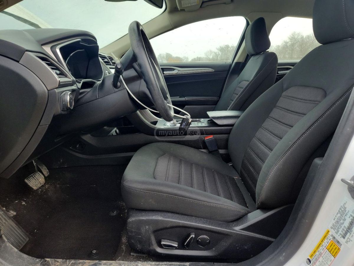 Ford Fusion - фото 7