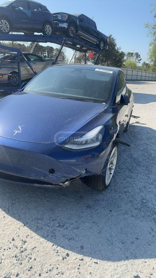 Tesla Model Y - фото 2