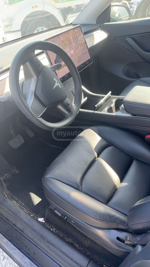 Tesla Model Y - фото 8