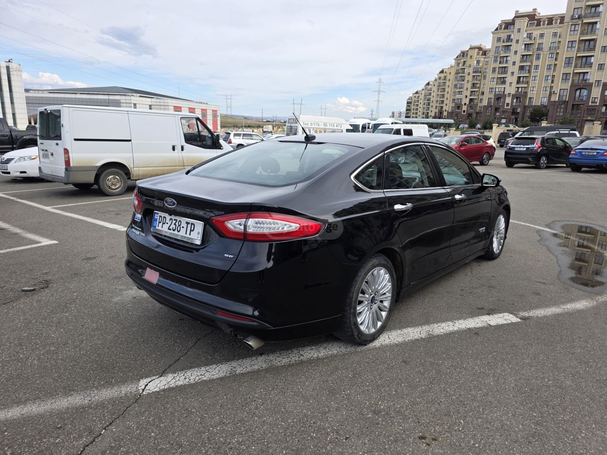 Ford Fusion - фото 6