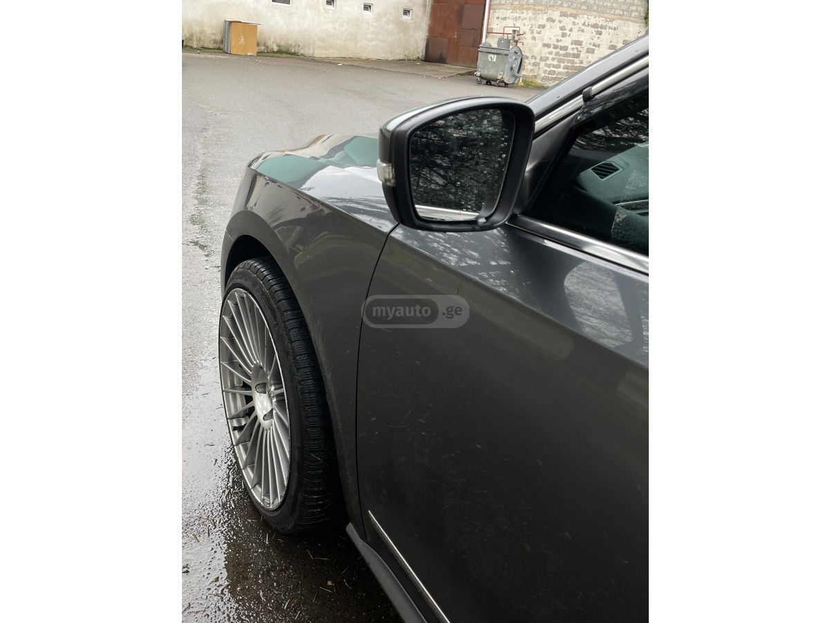 Volkswagen Passat - фото 11