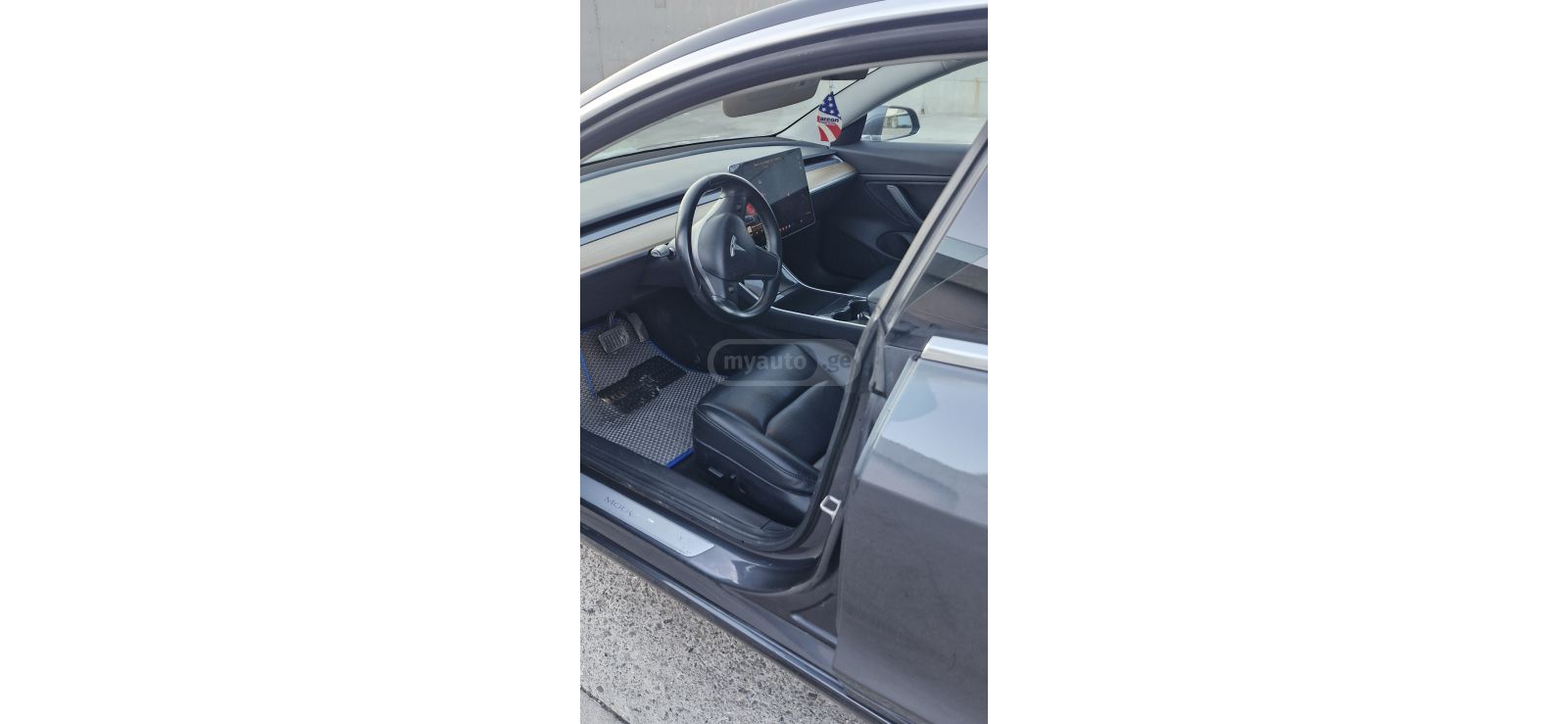 Tesla Model 3 - фото 7