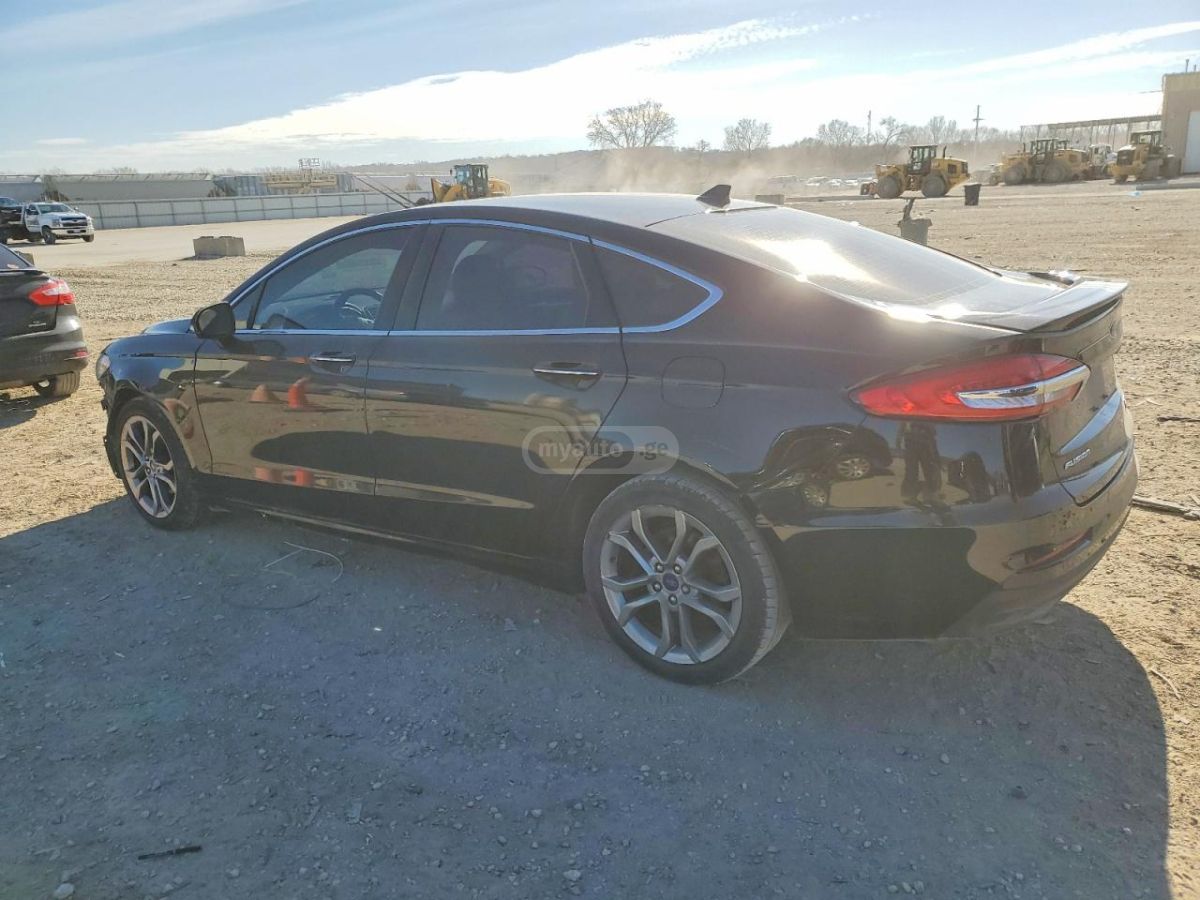 Ford Fusion - фото 2