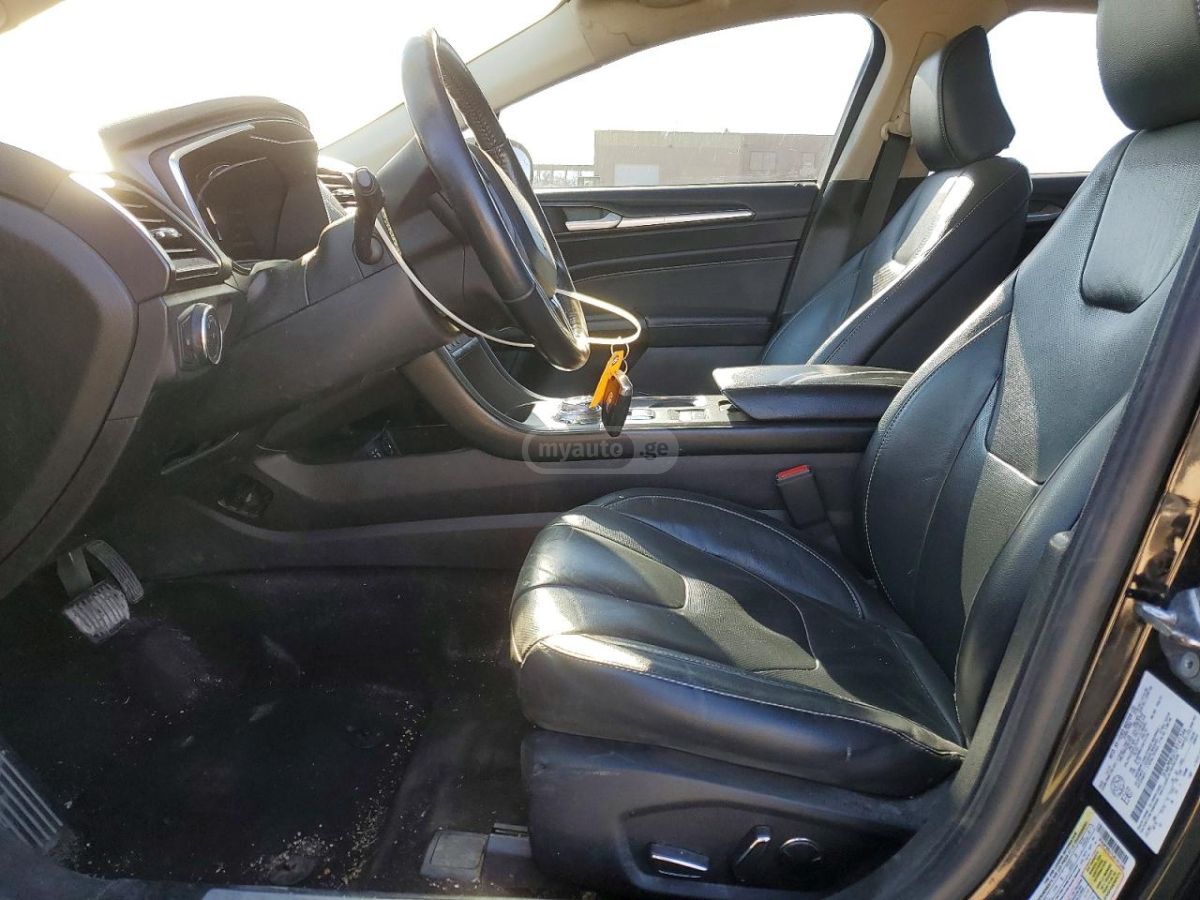 Ford Fusion - фото 7