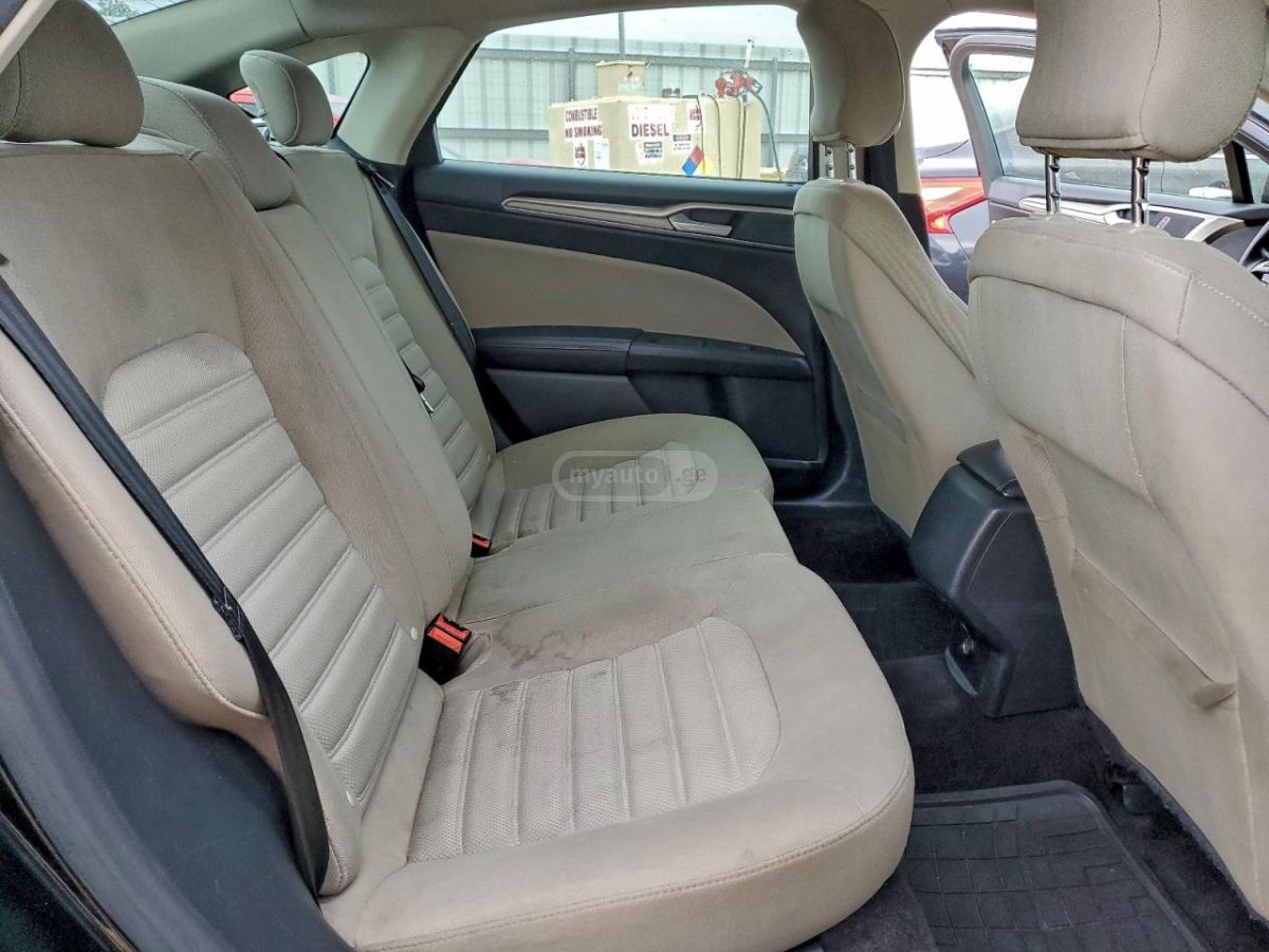 Ford Fusion - фото 10