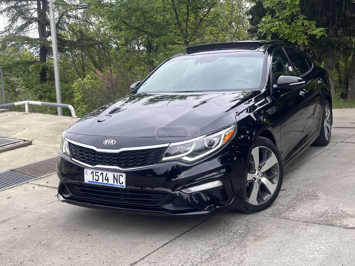 Kia Optima - фото 1