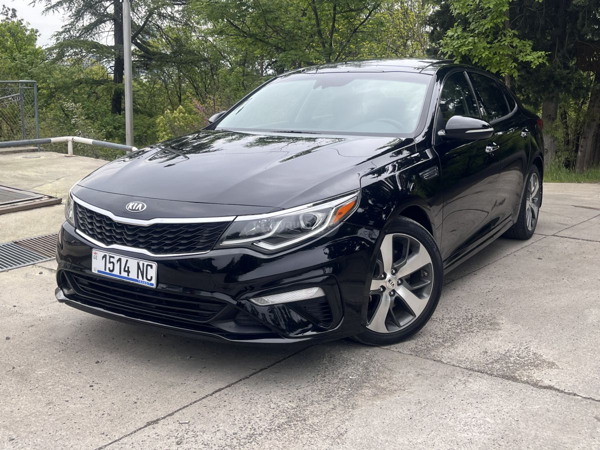 Kia Optima - фото 11