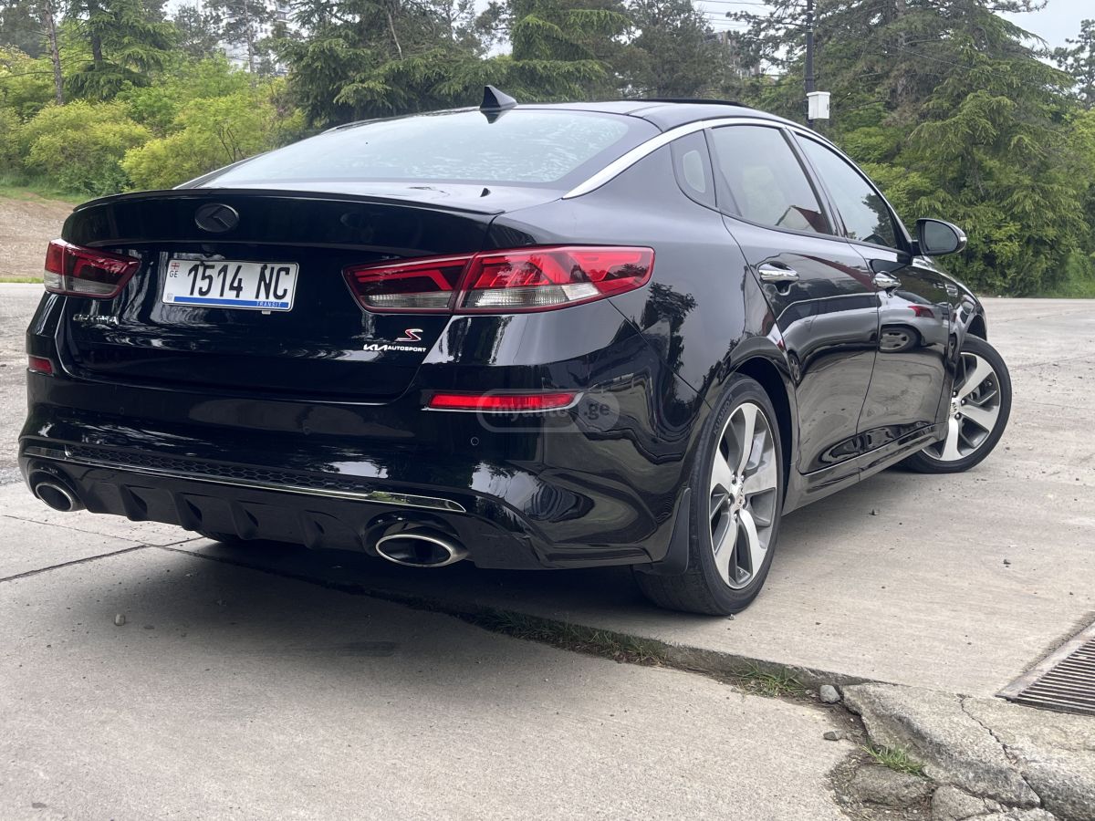 Kia Optima - фото 13