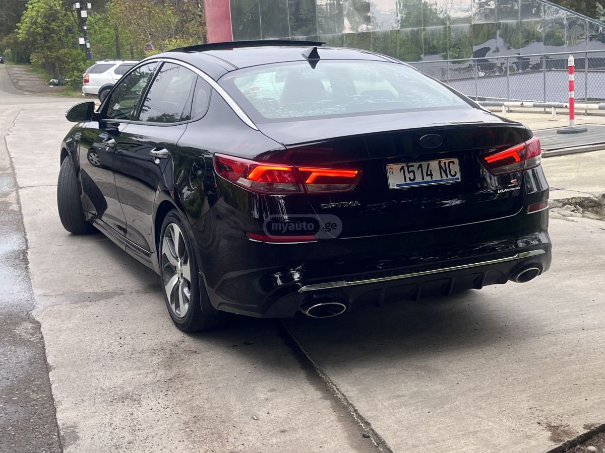 Kia Optima - фото 3