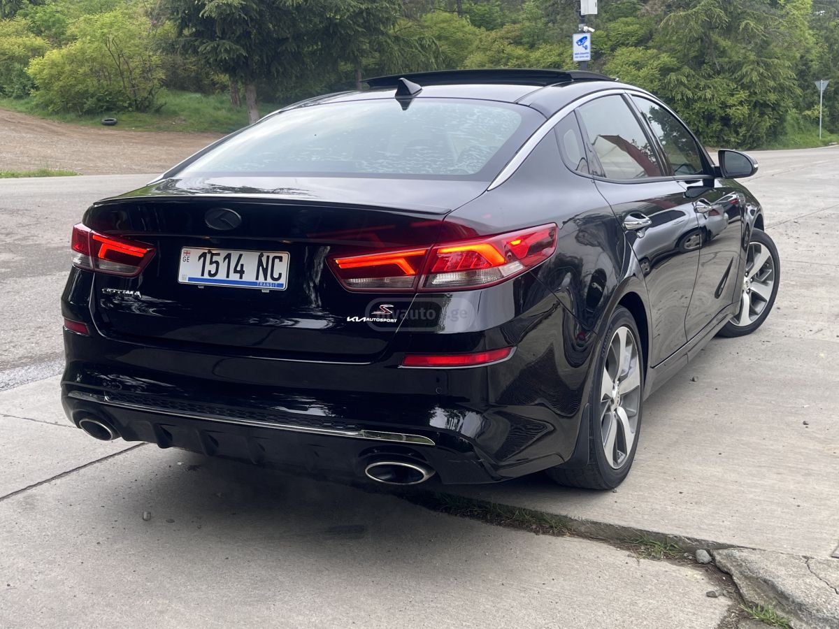 Kia Optima - фото 4