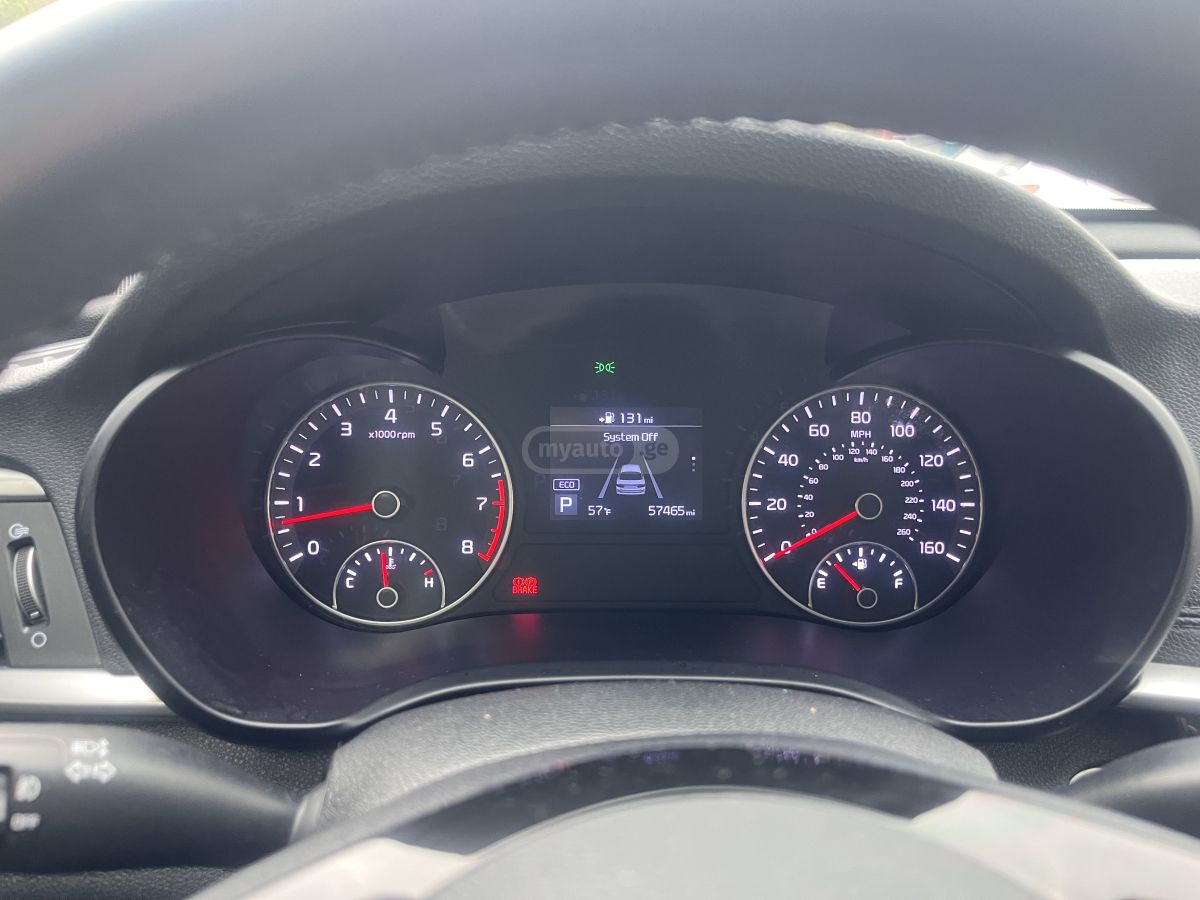Kia Optima - фото 5