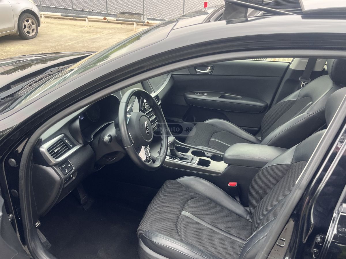 Kia Optima - фото 7