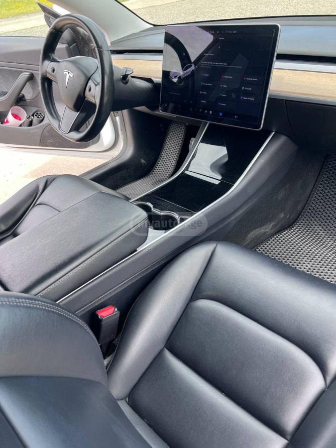 Tesla Model 3 - фото 10