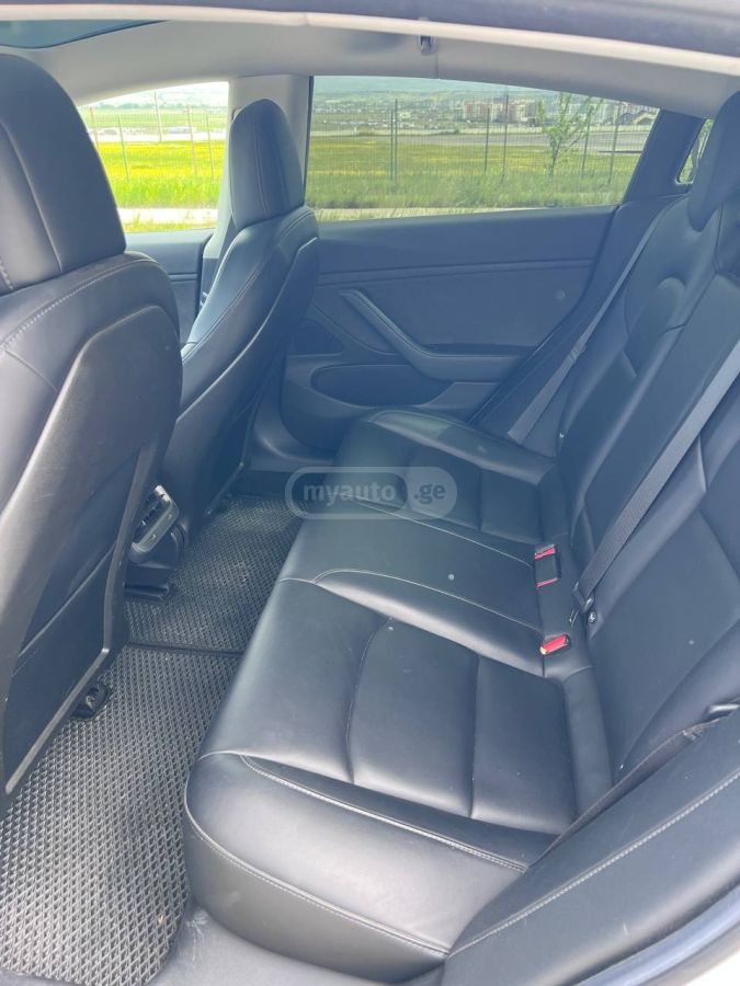 Tesla Model 3 - фото 11