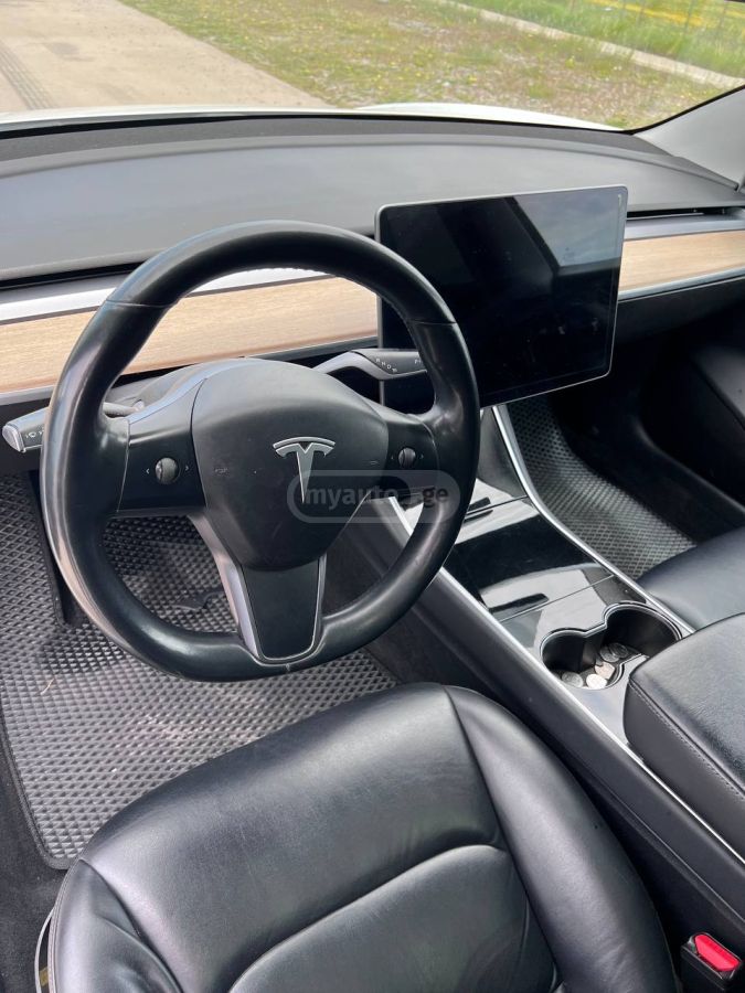 Tesla Model 3 - фото 7