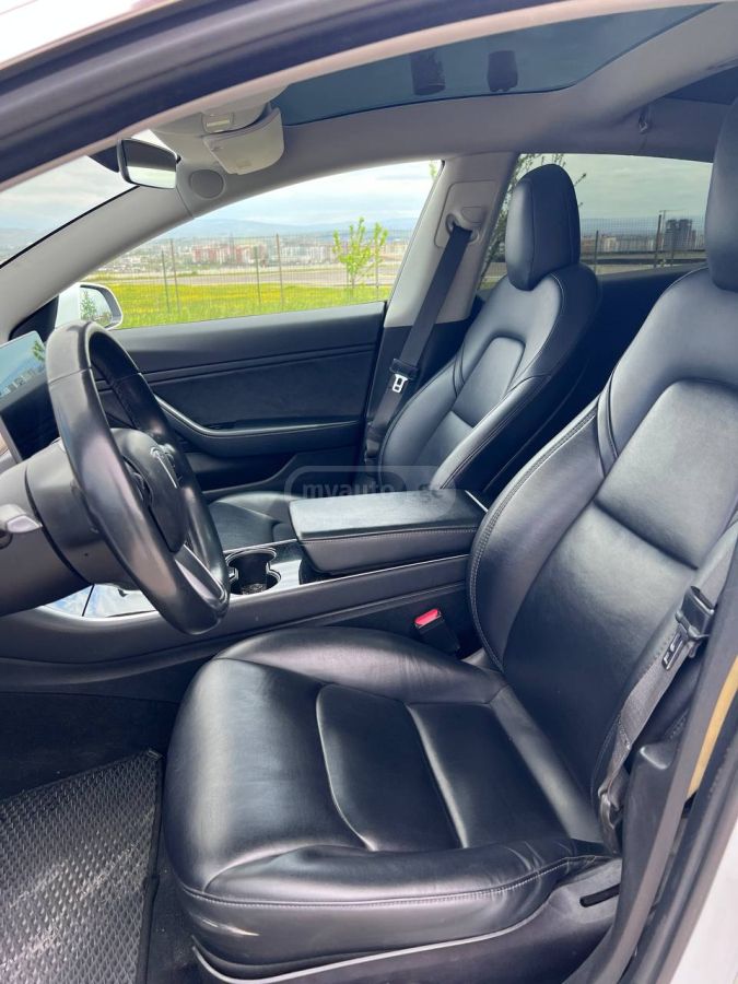 Tesla Model 3 - фото 8