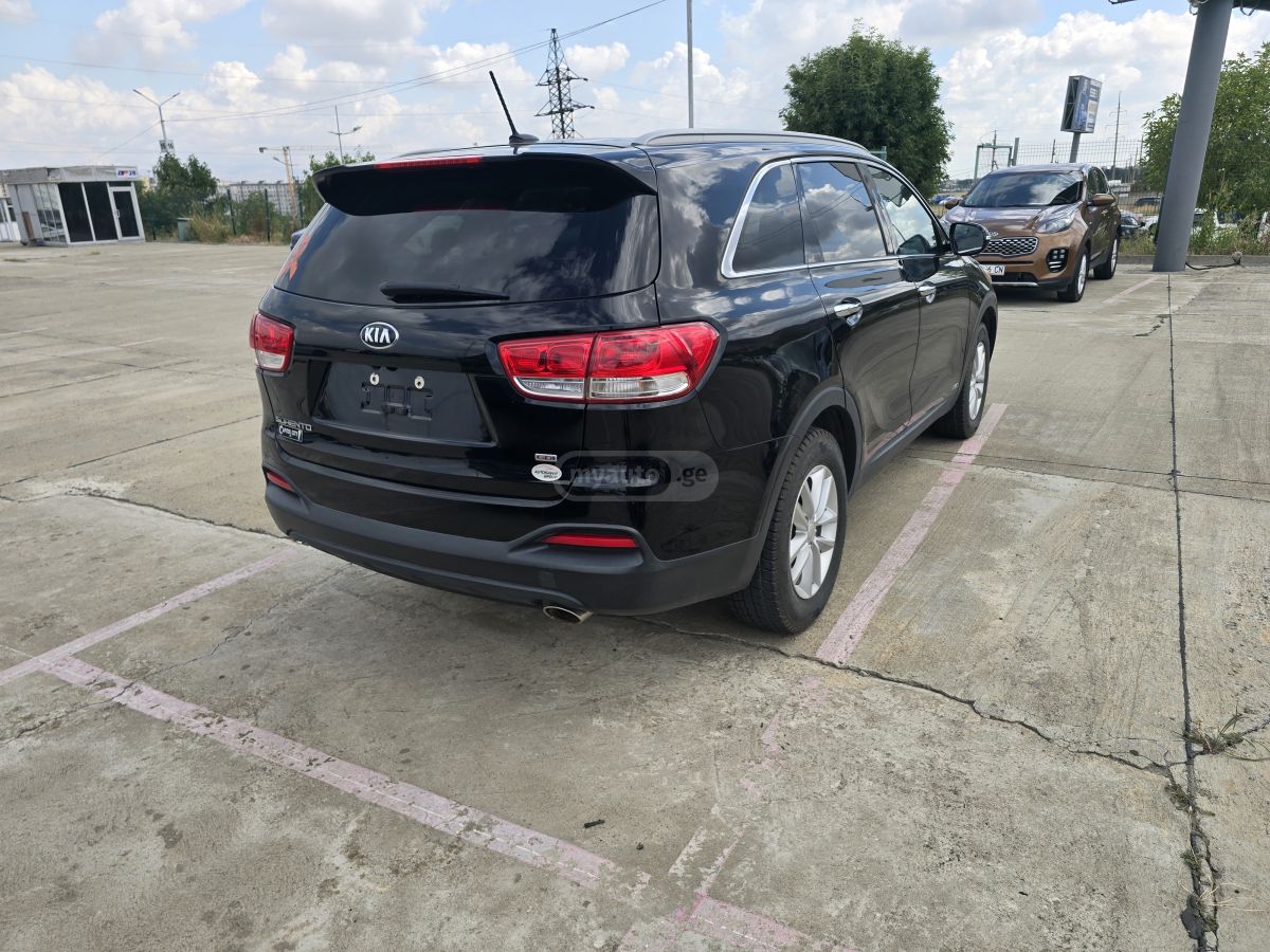 Kia Sorento - фото 8