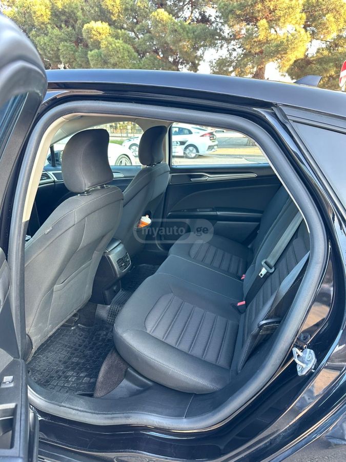 Ford Fusion - фото 7