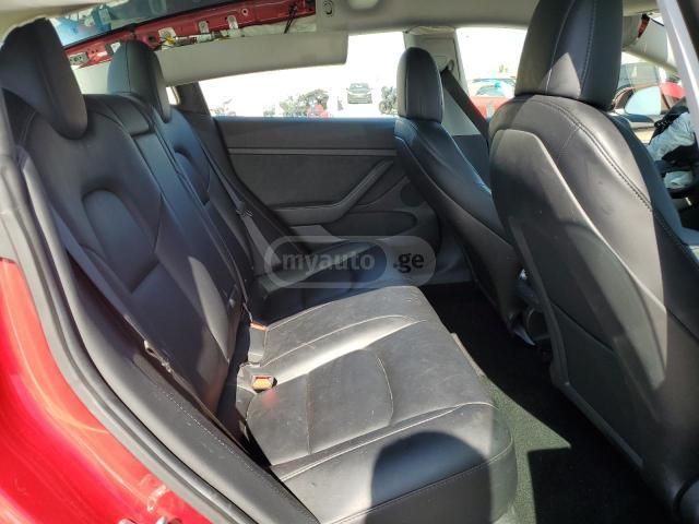 Tesla Model 3 - фото 10