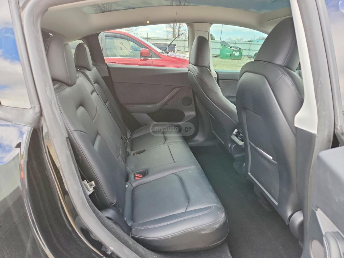 Tesla Model Y - фото 7