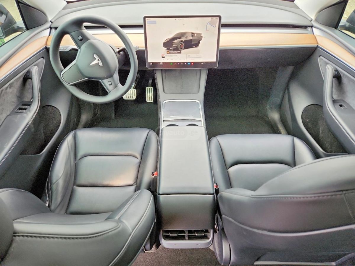 Tesla Model Y - фото 8