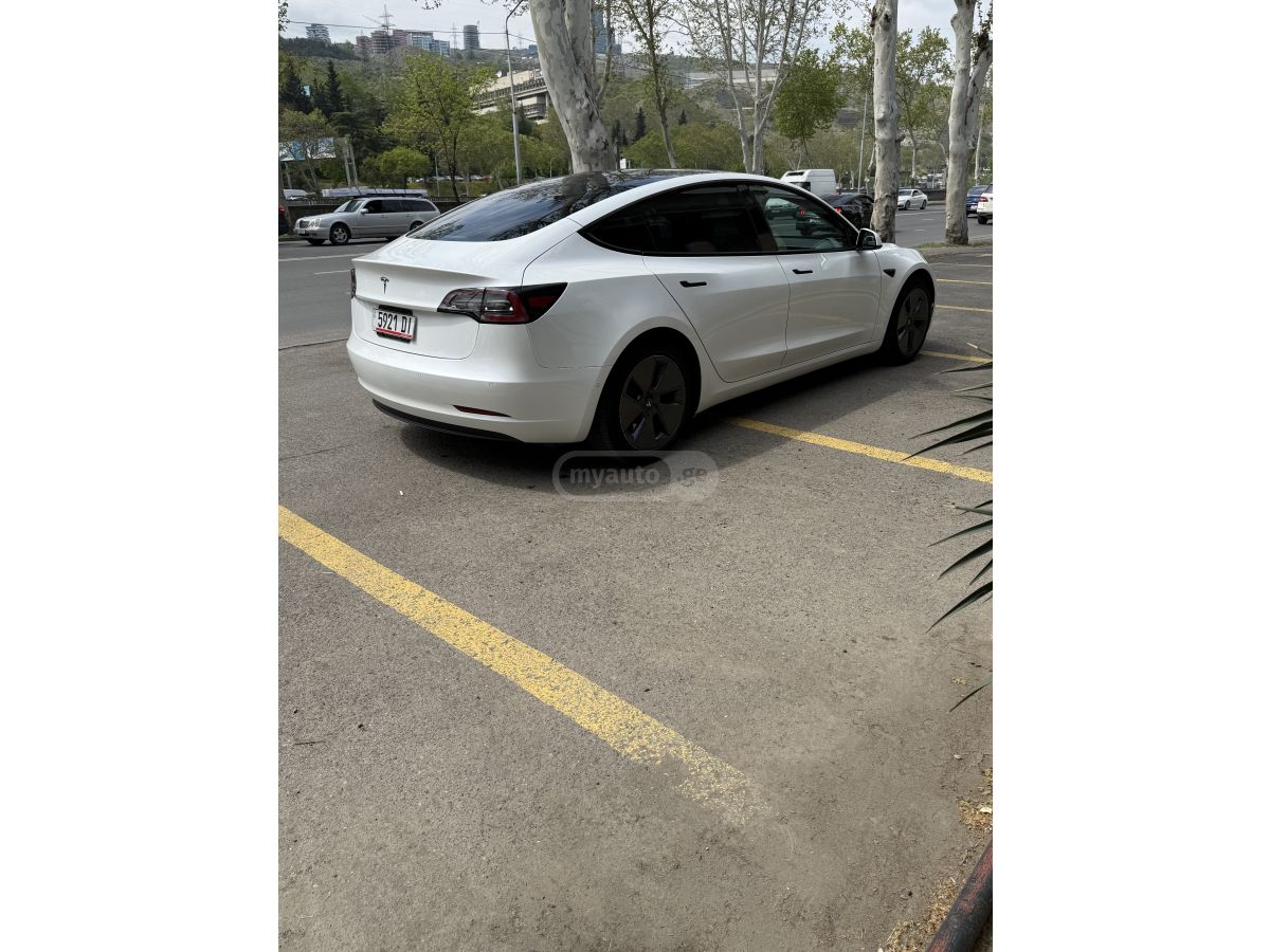 Tesla Model 3 - фото 5