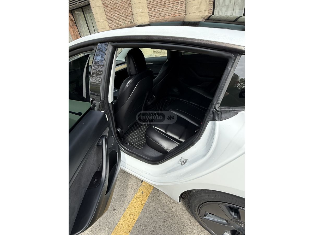 Tesla Model 3 - фото 7