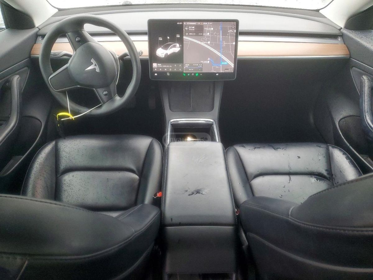 Tesla Model 3 - фото 8