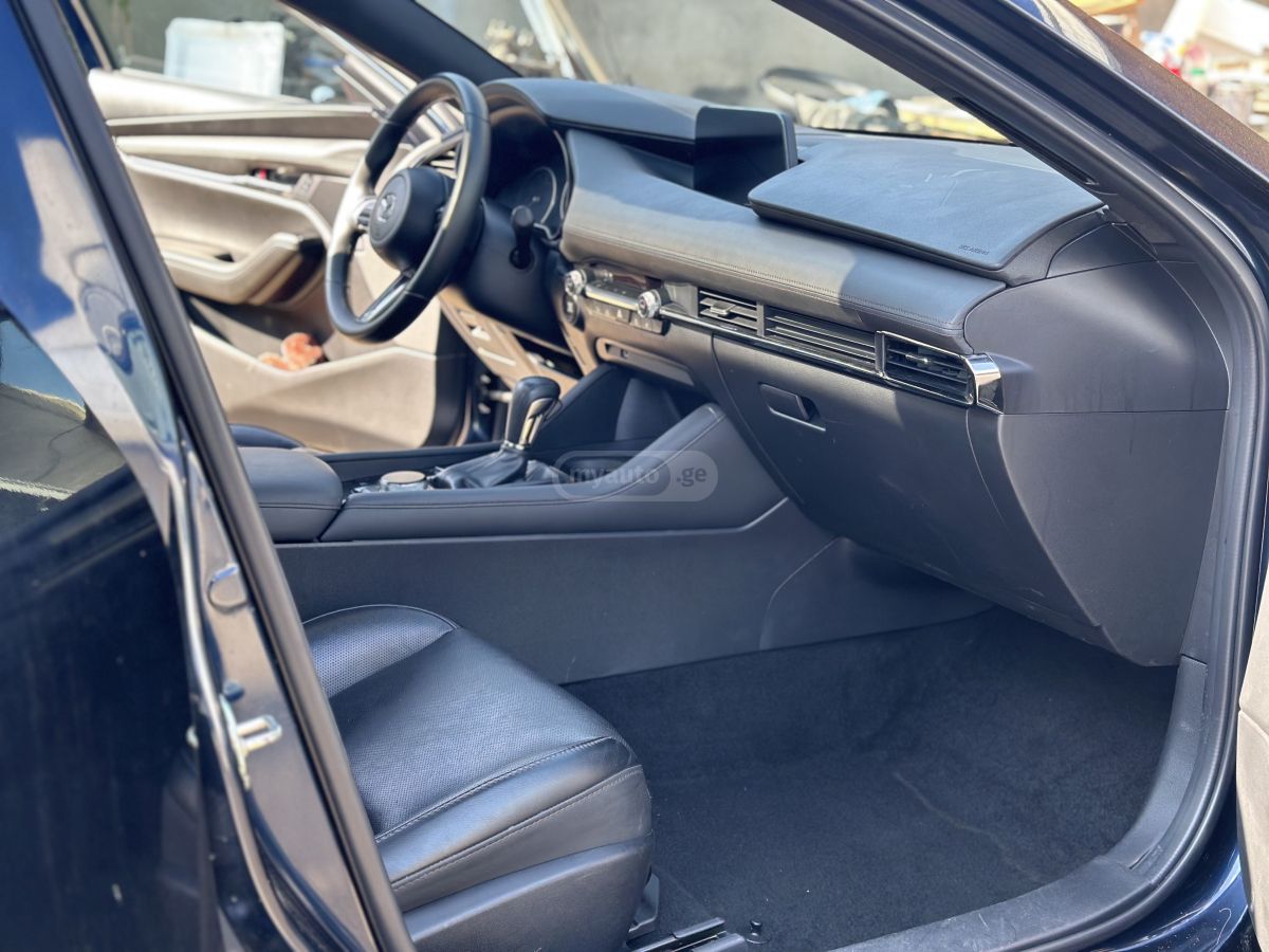 Mazda Mazda 3 - фото 8