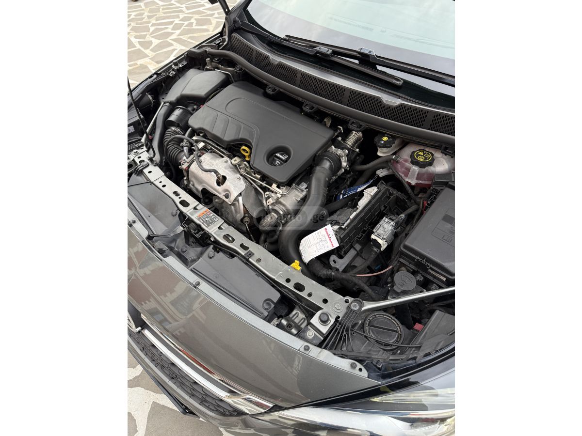 Opel Astra - фото 12