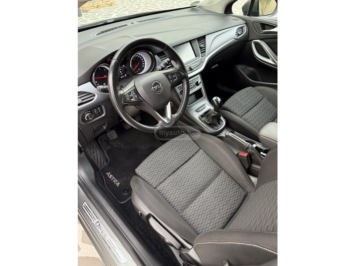 Opel Astra - фото 9