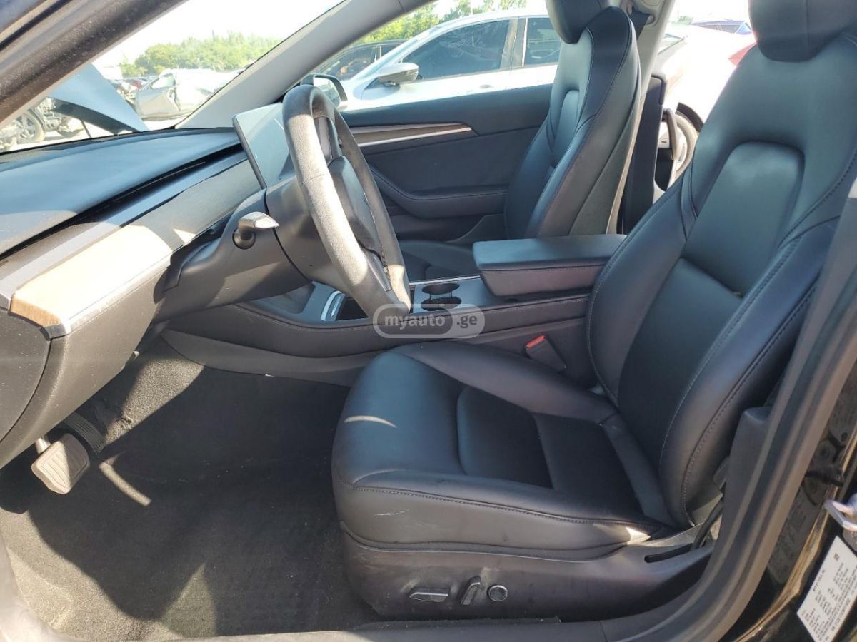 Tesla Model 3 - фото 7
