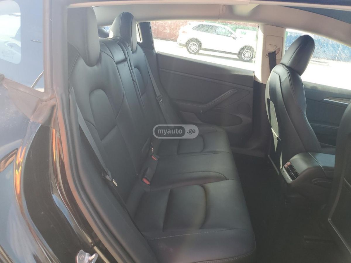 Tesla Model 3 - фото 8