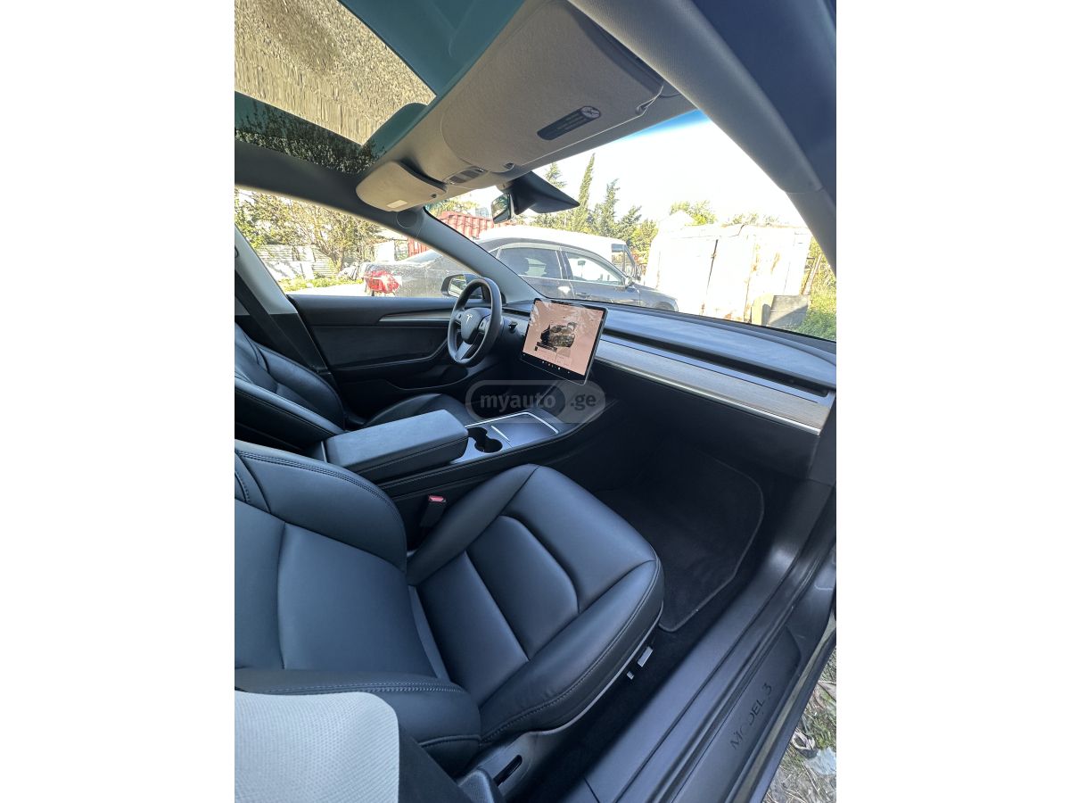 Tesla Model 3 - фото 10