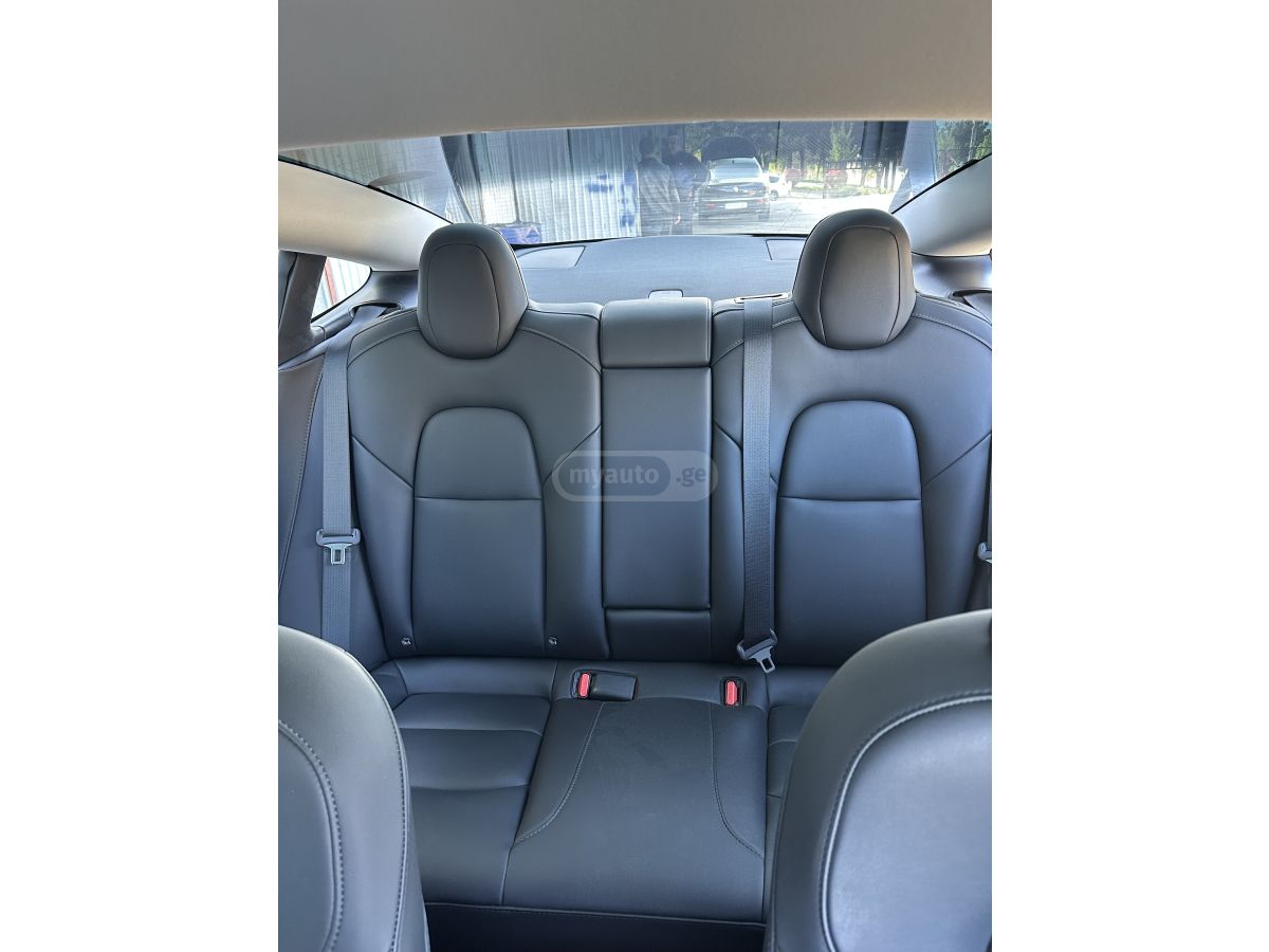 Tesla Model 3 - фото 11